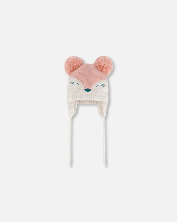 Bonnet en tricot rose pâle avec oreilles et tête de cerf